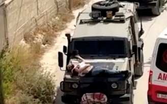 Mỹ nói gì về video người Palestine bị thương bị binh sĩ Israel trói vào xe?