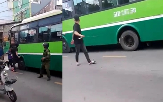 Cự cãi trên đường, tài xế xe tải cầm dao đuổi đánh bác tài xe buýt