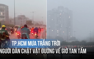 TP.HCM mưa trắng trời, người dân chật vật đường về giờ tan tầm
