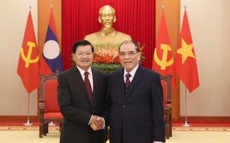 Nguyên Tổng Bí thư Nông Đức Mạnh tiếp Tổng Bí thư, Chủ tịch nước Lào