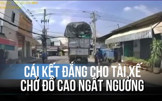 Thót tim xe tải chở đồ cao ngất ngưởng, rơi bao hàng trúng người đi đường