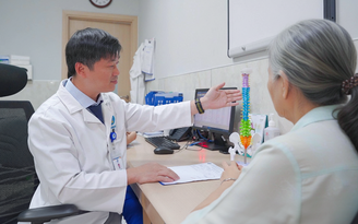 Thoát cảnh ngồi xe lăn sau 3 ngày phẫu thuật cột sống