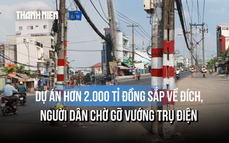 Đường rộng 6 làn sắp hoàn thiện, cột điện vẫn 'chễm chệ' giữa đường: Vì sao?