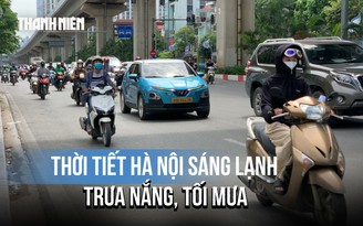 Người dân Hà Nội mặc áo khoác giữa mùa hè oi bức?