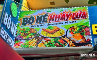 Biển hiệu AI ngày càng nhiều ở hàng quán TP.HCM, vì sao có khách không thích?