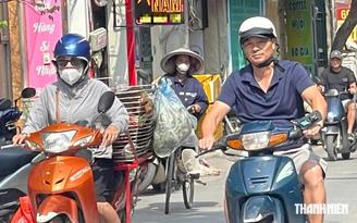Áp thấp nhiệt đới suy yếu, nắng nóng trở lại miền Bắc và miền Trung