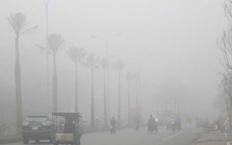 Sương mù giăng kín trời Hà Nội