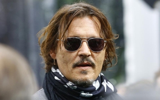 Johnny Depp bị tòa tuyên hành hung vợ, thua kiện tờ The Sun