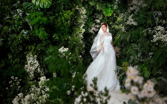 Hoa hậu Đỗ Mỹ Linh làm “cô dâu” mặc váy cưới trắng của Lê Thanh Hòa