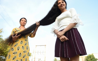 Cô gái lập kỷ lục thế giới về tóc dài sau một thập niên không cắt tóc