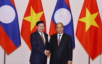 Việt Nam quyết tâm thúc đẩy hợp tác với Lào
