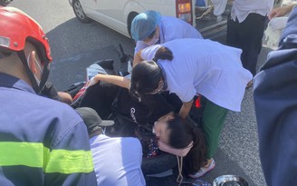 Đà Nẵng: Công an cắt xích xe, cứu cô gái kẹt do bị cuốn áo chống nắng