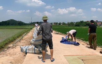Người dân H.Sóc Sơn giải tán, cho xe chở rác vào bãi rác Nam Sơn