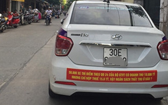 Sở GTVT Hà Nội yêu cầu doanh nghiệp taxi tháo biểu ngữ phản đối Uber, Grab