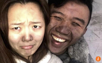 Bị cháy nhà, cặp vợ chồng trẻ vẫn thản nhiên selfie
