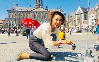 Á hậu Hoàng Oanh đội nón lá du ngoạn khắp châu Âu
