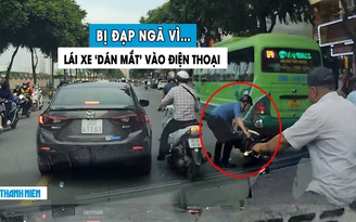 Người đàn ông bị đạp ngã vì vừa lái xe máy vừa ‘dán mắt’ vào điện thoại
