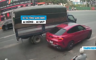 Xe sang BMW X6 sang đường bị xe tải tông văng cản: Ai đúng ai sai?