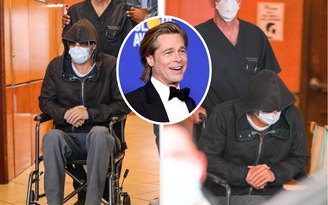 Brad Pitt lộ ảnh ngồi xe lăn, vệ sĩ và nhân viên y tế hộ tống