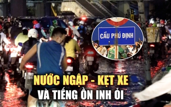 Vượt 'khổ ải' về nhà ngày triều cường ở TP.HCM