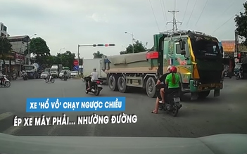 Xe tải cố chấp chạy ngược chiều, ép nhiều xe máy chờ đèn đỏ phái tránh đường