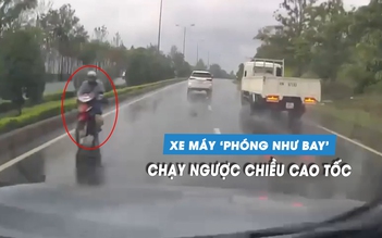 Kinh hoàng xe máy phóng ngược chiều 'như bay' trên cao tốc lúc trời mưa to