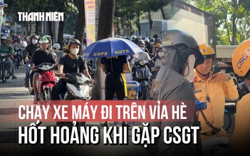 Người chạy xe máy đi trên vỉa hè đường Võ Thị Sáu hốt hoảng khi gặp CSGT