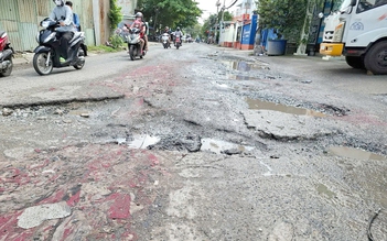 Đường bong tróc nhựa, đi lại khó khăn