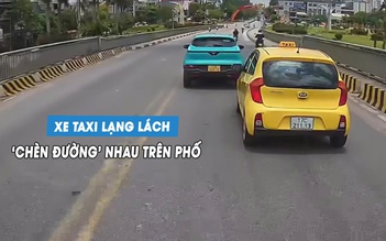 Hai xe taxi 'kèn cựa', chèn đường nhau trên phố như phim hành động