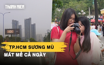 TP.HCM sương mù, mát mẻ cả ngày: Người mưu sinh dễ thở, người du xuân thích thú
