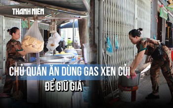 Chủ quán ăn dùng gas xen củi để giữ giá