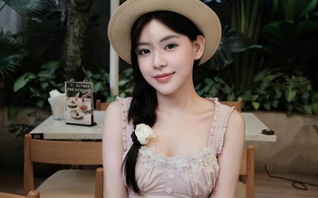 Chút tinh tế từ áo kiểu đính khuy giúp nàng thêm phần thanh lịch