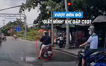Thanh niên lái xe máy vượt đèn đỏ, 'hết hồn' phanh gấp khi thấy CSGT