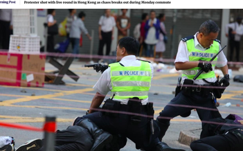 Bị tấn công, cảnh sát Hồng Kông nổ súng vào người biểu tình