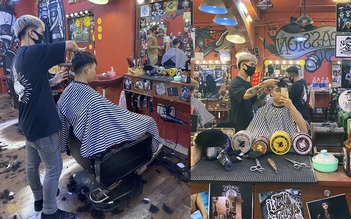 Thợ cắt tóc Sài Gòn đứng suốt làm cho khách sau cách ly xã hội