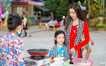 Hoa hậu Mỹ Linh và bé Bảo Ngọc thu hút với áo bà ba