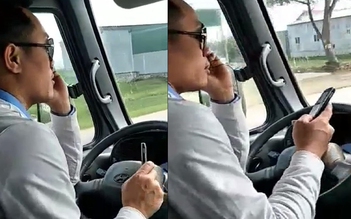 Tài xế xe buýt dùng khuỷu tay lái xe vì hai tay 'bận' cầm điện thoại
