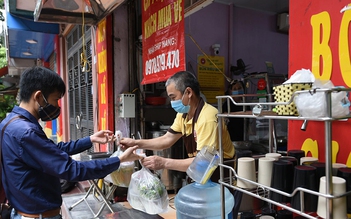 Hàng quán Hà Nội vắng khách ngày đầu mở bán mang về