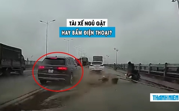 Xe sang Audi húc bay dải phân cách: Tài xế buồn ngủ hay mải bấm điện thoại?