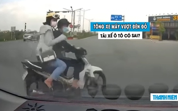 Xe máy vượt đèn đỏ bị ô tô tông văng: Dân mạng tranh cãi
