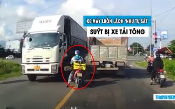 Thanh niên lái xe máy lấn làn ‘như tự sát’, suýt bị xe tải tông trúng