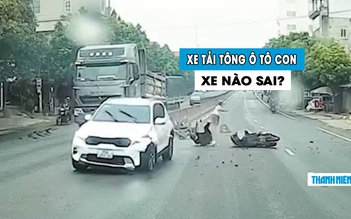 Ô tô con xi-nhan phải nhưng lách sang trái bị xe tải đâm: Ai đúng ai sai?