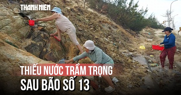 Người dân hứng nước suối để ăn uống sau bão số 13