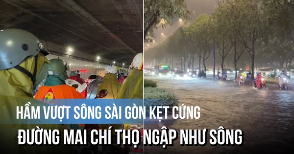 Mưa lớn giờ tan tầm, hầm vượt sông Sài Gòn kẹt cứng, đường Mai Chí Thọ ngập như sông