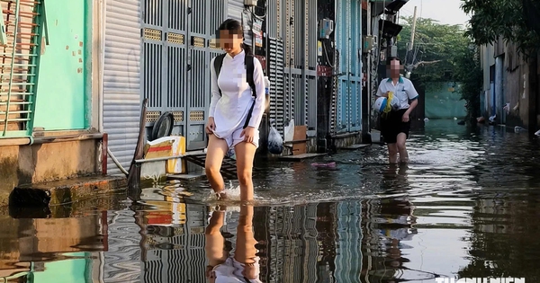 Trường ở TP.HCM không bắt buộc mặc áo dài, mang giày bata ngày mưa, ngập