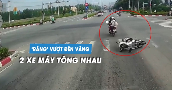 Hai xe máy 'ráng' vượt đèn vàng gây tai nạn tại ngã tư