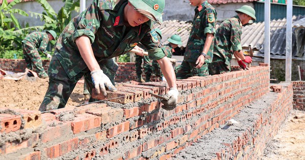 First new homes rise after floods in Muong Than: 'After the rain, the sky clears'
