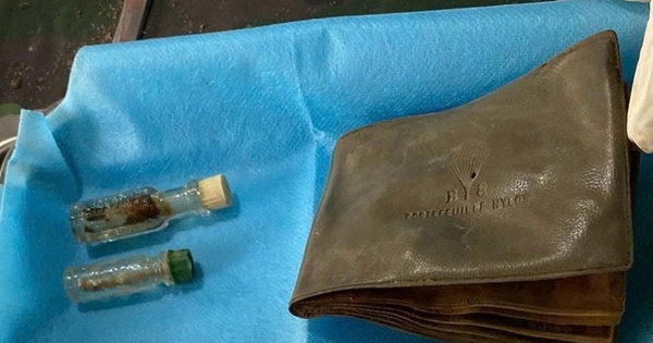 Wallet with Portraits Found in Soldier's Grave in Lam Dong