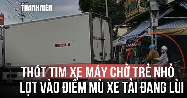 Thót tim xe máy chở trẻ nhỏ lọt vào điểm mù xe tải đang lùi