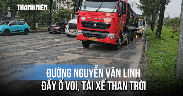 Đường Nguyễn Văn Linh ở TP.HCM đầy ổ voi, tài xế than trời